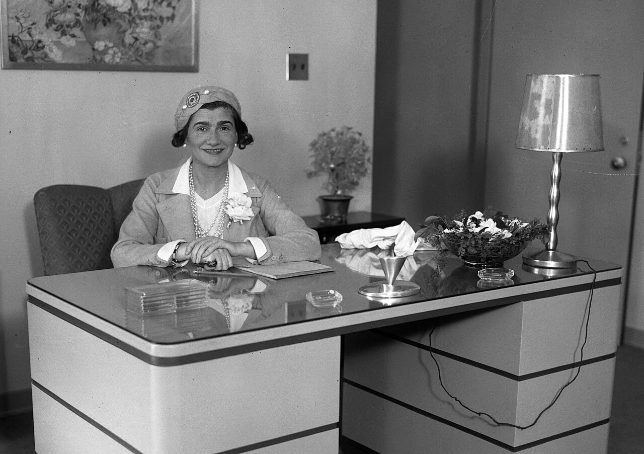 Coco Chanel seated at her desk in Los Angeles, 1931
