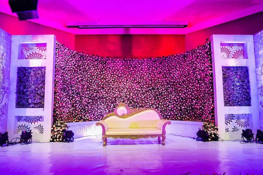 Wedding reception stage by EthniQ Events Management, Hyderabad