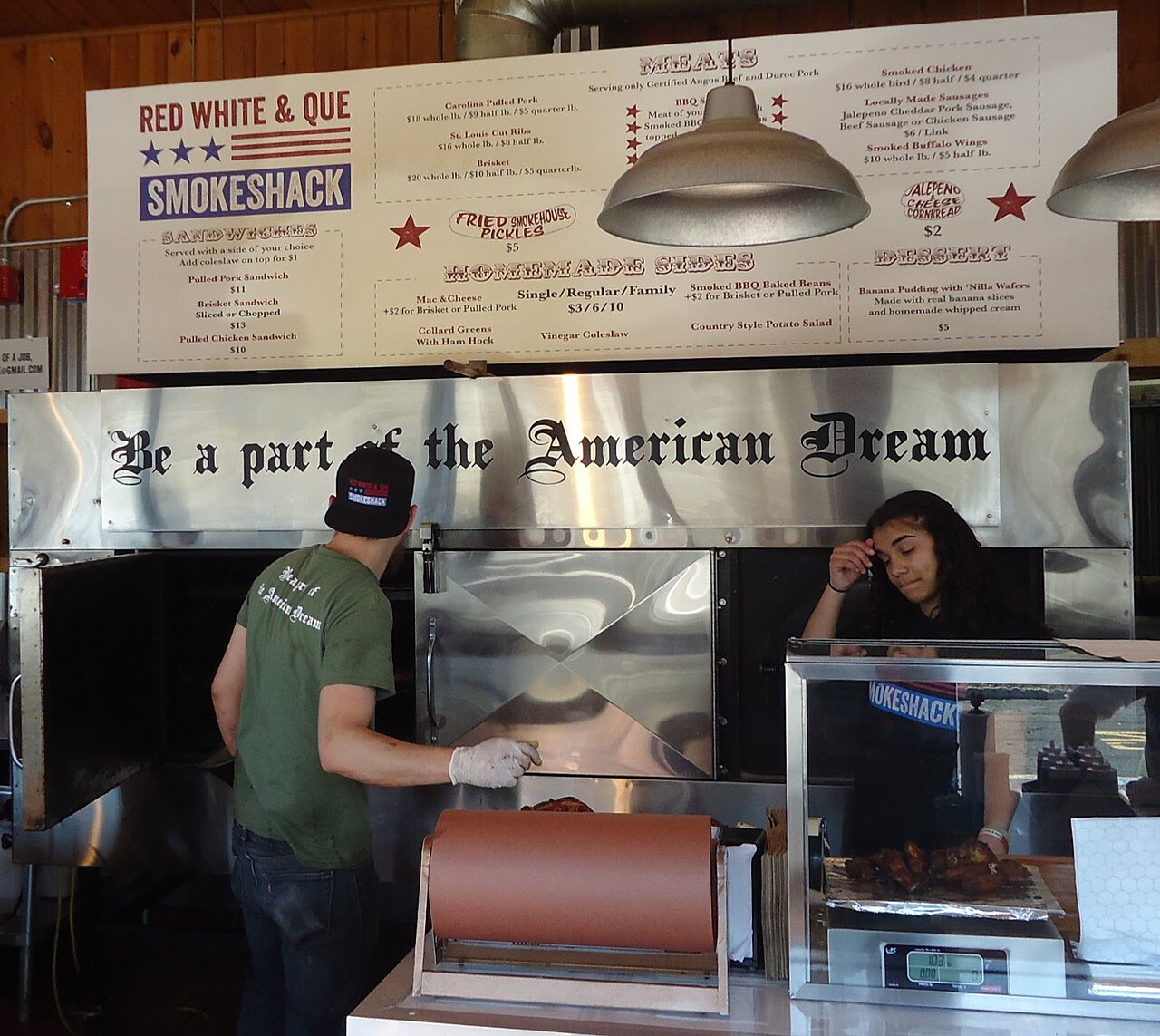 A restaurant menu board above a service counter