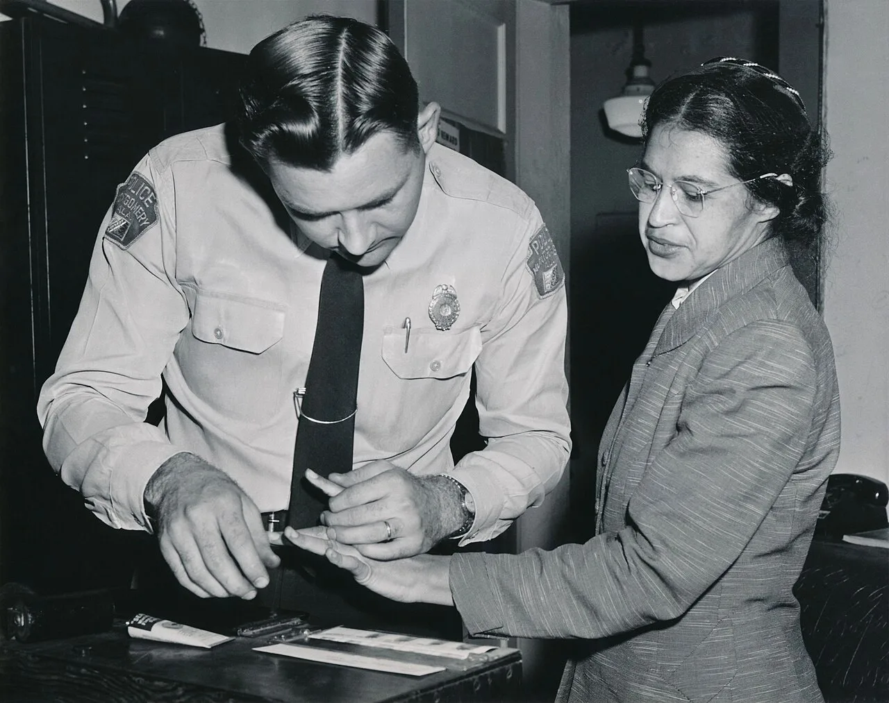 Rosa Parks being fingerprinted in Montgomery, Alabama, in February 1956 during the bus boycott