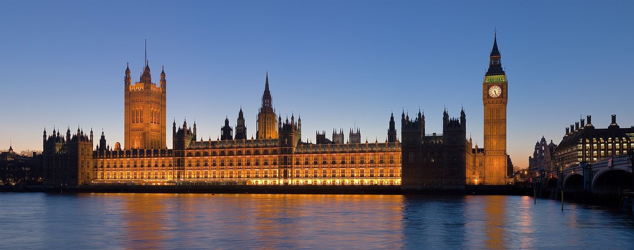 The Palace of Westminster and Big Ben across the Thames at dusk, London