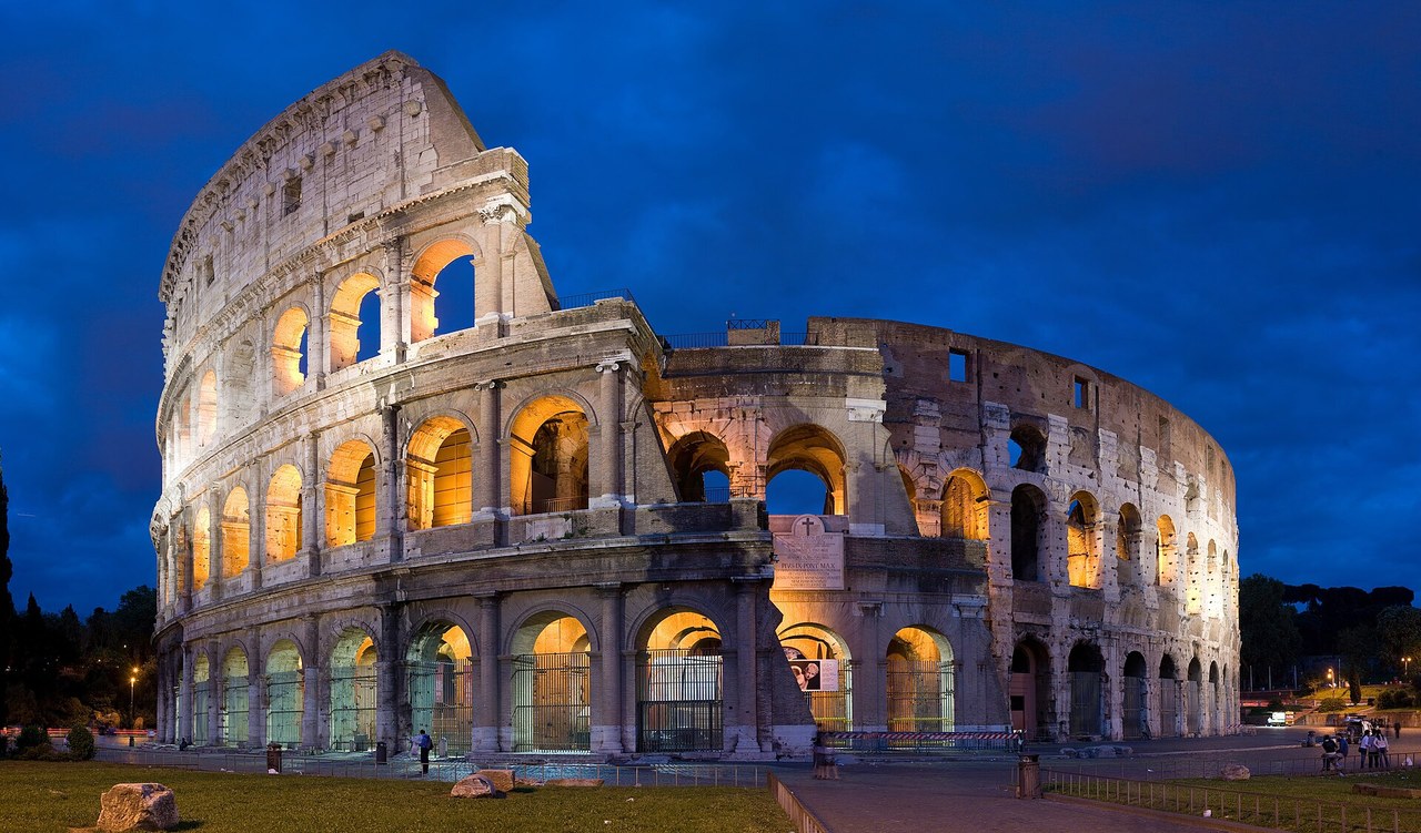 The Colosseum illuminated at dusk, Rome