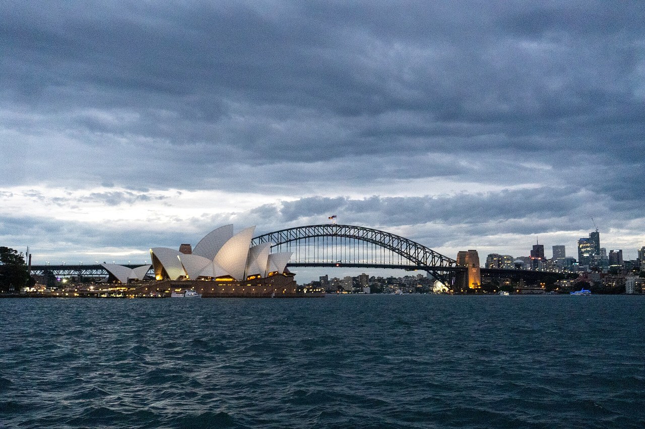 Sydney Opera House and Harbour Bridge seen from the harbour water